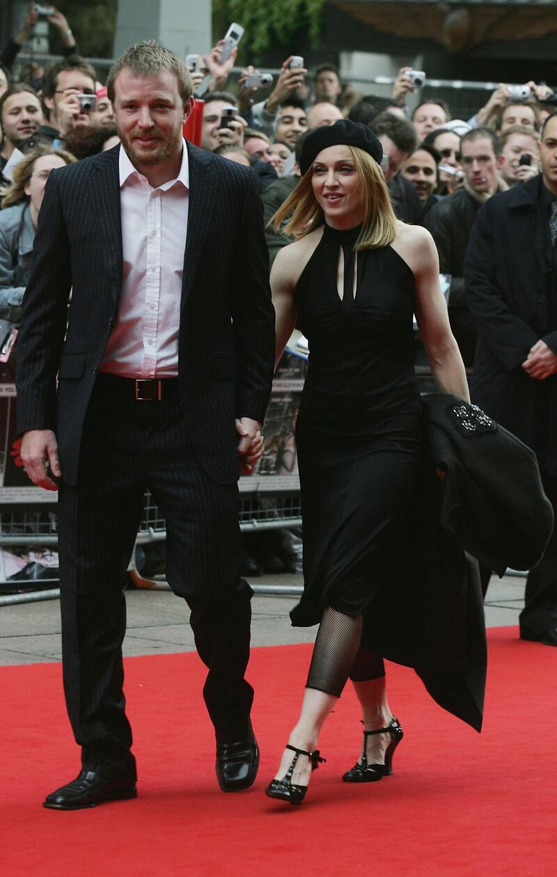 LONDON - MAY 23: Madonna and Guy Ritchie arrive at the UK Premiere of "Sin City" at the Empire Leicester Square on May 23, 2005 in London, England. (Photo by Jo Hale/Getty Images) 