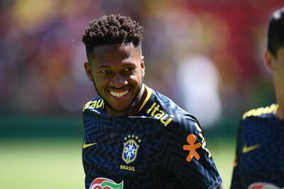 Brazil's midfielder Fred smiles as he warms up ahead of the International friendly football match between Brazil and Croatia at Anfield in Liverpool on June 3, 2018.  / AFP / Oli SCARFF                          
