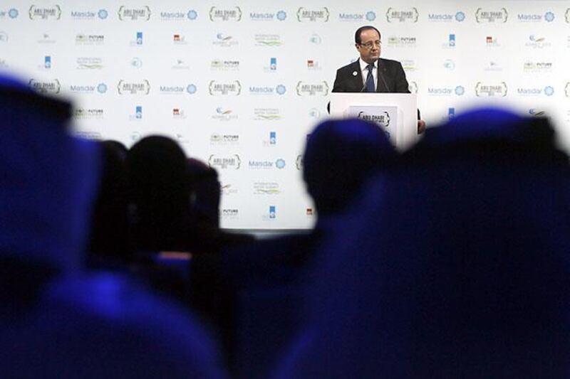France's President Francois Hollande delivers a speech at the opening ceremony of the World Future Energy Summit (WFES) in Abu Dhabi on January 15, 2013. AFP PHOTO/KARIM SAHIB

