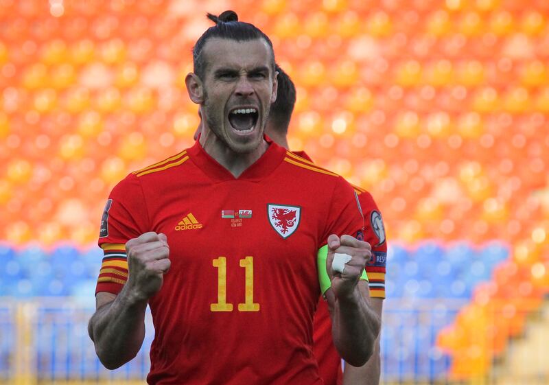 Wales' Gareth Bale celebrates scoring the first of his three goals in their World Cup qualifying win at Belarus on Sunday, September 5. AP