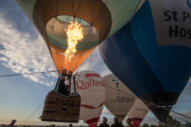 A tethered balloon lights its burners. Getty Images