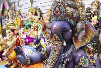 DUBAI, UNITED ARAB EMIRATES , August 17 – 2020 :- Colourful Ganesh statues made by plaster of paris on display at the Madhoor store in Bur Dubai in Dubai. Ganesh Festival will start on 22nd August. Authorities in the UAE are advising the Indian community to limit the number to immediate family members to prevent the spread of the coronavirus. (Pawan Singh / The National) For News/Online/Instagram. Story by Ramola