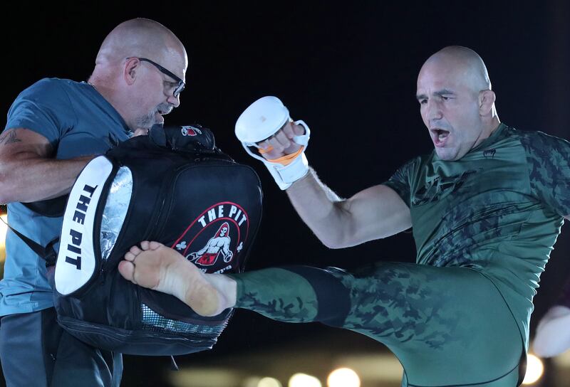 UFC light heavyweight challenger Glover Teixeira kicks the pad.