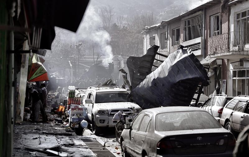 Smoke billows from the scene of a suicide bomb attack in Kabul. Hedayatullah Amid / EPA