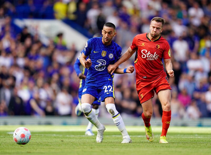 Chelsea's Hakim Ziyech, left, and Watford's Tom Cleverley battle for the ball during their Premier League match at Stamford Bridge on May 22, 2022. PA