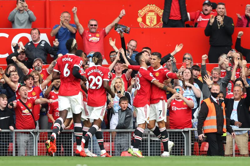 Cristiano Ronaldo celebrates with Bruno Fernandes after scoring Manchester United's first goal. Getty Images