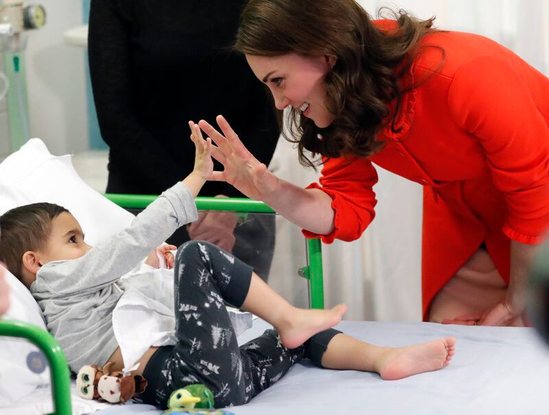 Catherine with four-year-old Rafael Chana on a visit to Great Ormond Street Hospital in London to officially open the Mittal Children's Medical Centre in January 2018