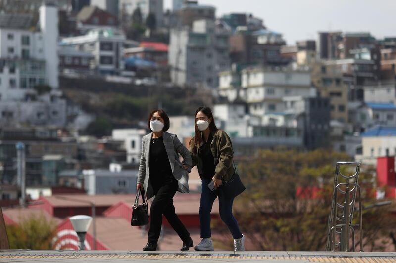 Masks are a common sight on the streets of Seoul, April 10. Chung Sung-Jun/Getty