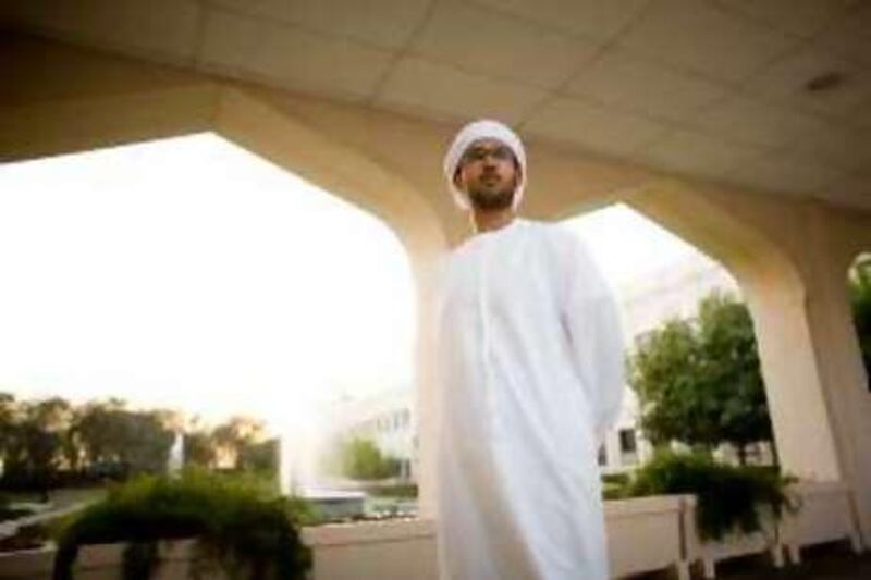 November 12, 2008 / Abu Dhabi / Higher Colleges of Technology (CQ) student Mohamed al Mahmoud (CQ), 21, poses for a portrait on the campus of HCT, Thursday, November 12, 2008. (Rich-Joseph Facun / The National) *** Local Caption ***  rjf-1113-student005.JPG