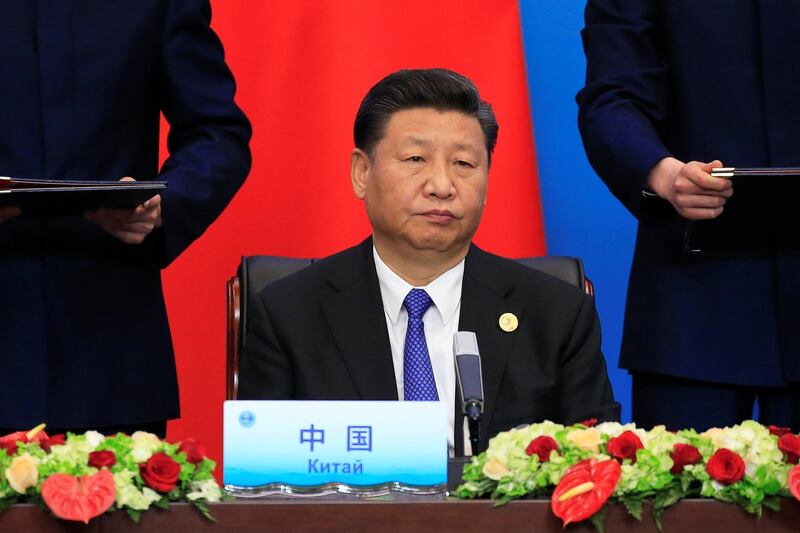 China's President Xi Jinping attends a signing ceremony during Shanghai Cooperation Organization (SCO) summit in Qingdao, Shandong Province, China June 10, 2018. REUTERS/Aly Song