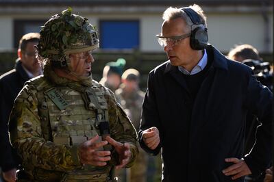 Jens Stoltenberg, right, has led Nato since 2014. Getty 
