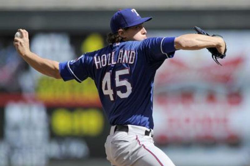 Derek Holland pitched impressively against the Minnesota Twins. Hannah Foslien / Getty Images / AFP