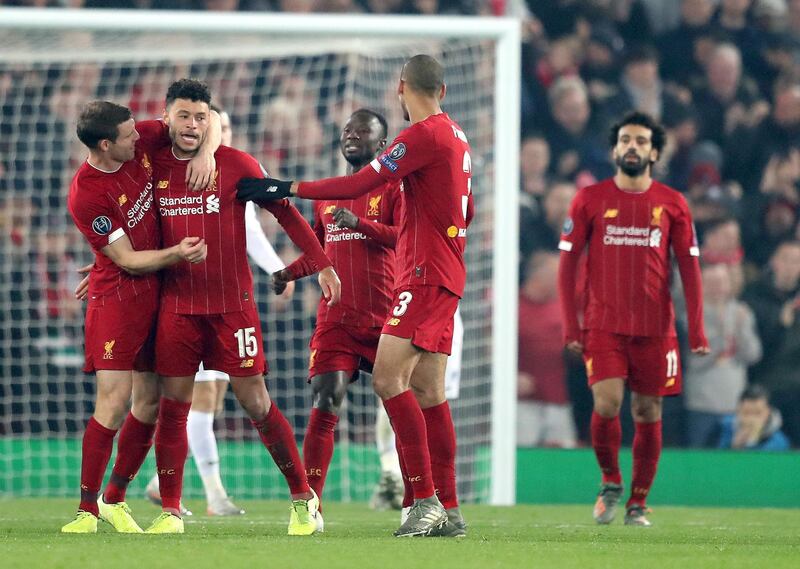 LIVERPOOL, ENGLAND - NOVEMBER 05: Alex Oxlade-Chamberlain of Liverpool celebrates with teammates after scoring his teams second goal during the UEFA Champions League group E match between Liverpool FC and KRC Genk at Anfield on November 05, 2019 in Liverpool, United Kingdom. (Photo by Alex Pantling/Getty Images)