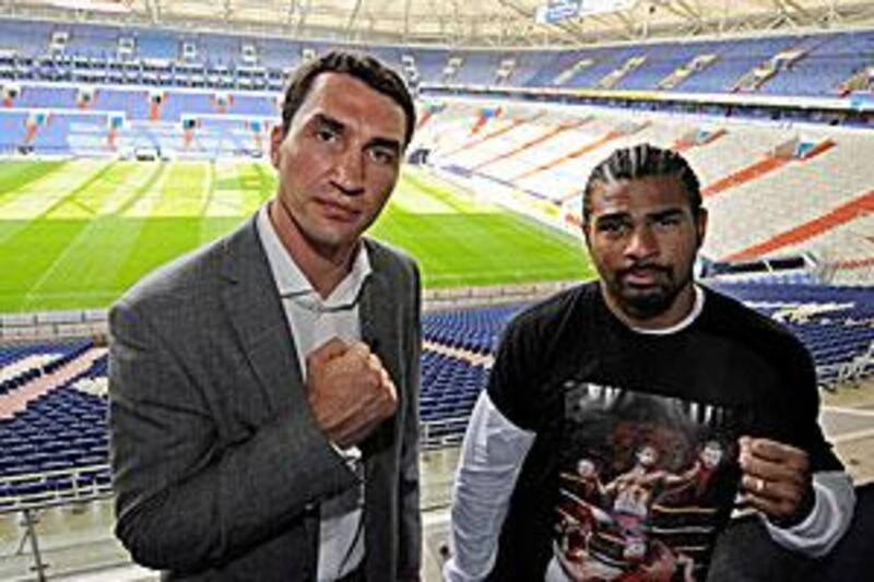 Vladimir Klitschko, left, and David Haye pose for the camera.