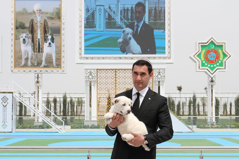 Turkmenistan's Deputy Prime Minister Serdar Berdymukhamedov, son of President Kurbanguly Berdymukhamedov, holds a puppy of a Turkmen shepherd dog, locally known as Alabai. Reuters
