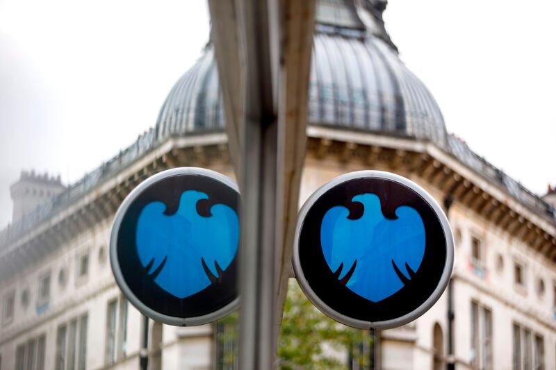 (FILES) This file photo taken on October 22, 2017 shows signage at the front of a branch of Barclays bank in central London on October 22, 2017.
British bank giant Barclays on October 26, 2017 logged soaring third-quarter net profits, buoyed by the absence of restructuring and mis-selling charges -- and by improving UK profitability despite looming Brexit. / AFP PHOTO / Tolga Akmen