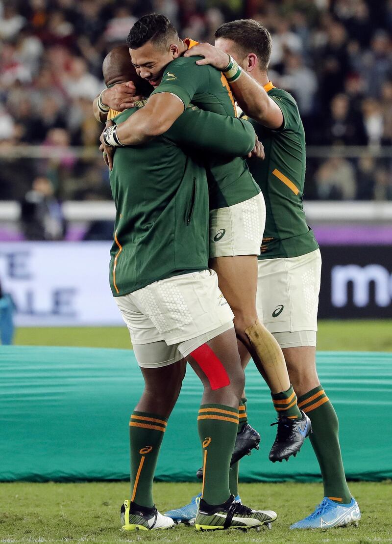 Herschel Jantjies of South Africa (C) celebrates with teammates after the Rugby World Cup final match between England and South Africa at the International Stadium Yokohama, Kanagawa Prefecture, Yokohama, Japan.  EPA