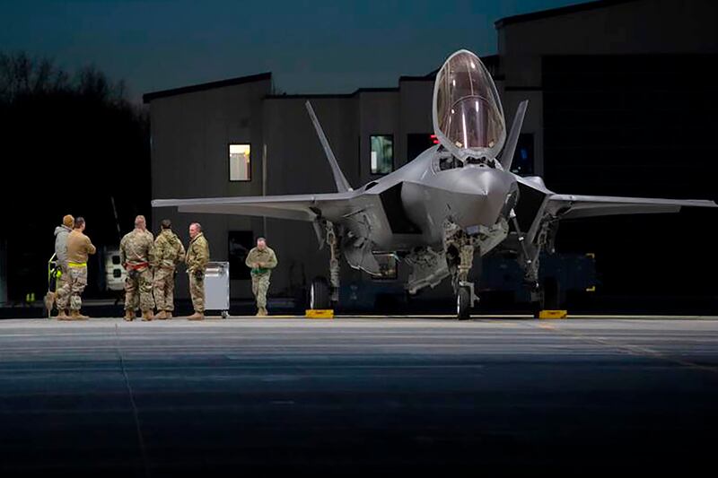 Crew chiefs and engineers with the 158th Fighter Wing meet before launching F-35A Lightning II fifth-generation aircraft at the Vermont Air National Guard Base, South Burlington, US. More than 200 Vermont air guard personnel, plus equipment and eight F-35s, are now in Europe.  AP