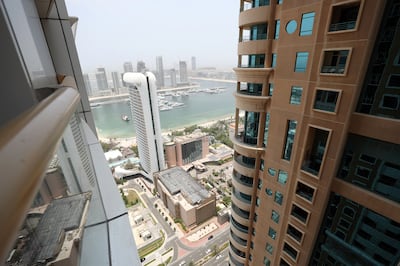 The view that British software programmer Kriss Harris has from his one-bedroom Dubai Marina apartment. Chris Whiteoak / The National