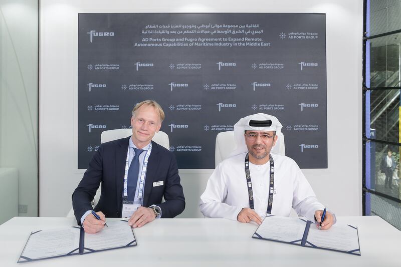 Mohamed Al Shamisi, managing director and group chief executive of AD Ports Group, right, and Fugro chief executive Mark Heine at the signing ceremony in Abu Dhabi. Photo: AD Ports Group