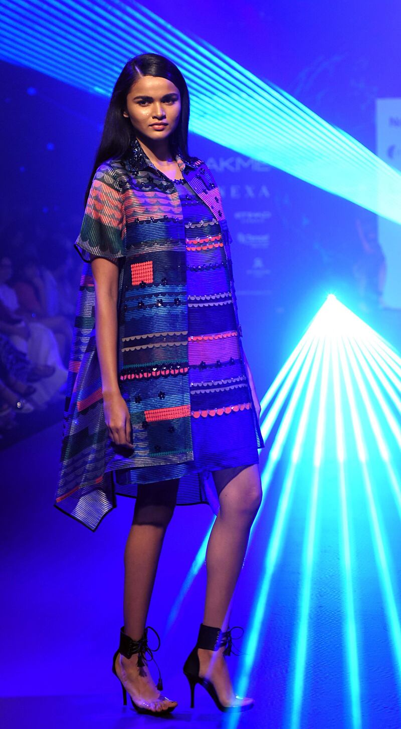 A patchwork outfit by Pankaj & Nidhi. AFP