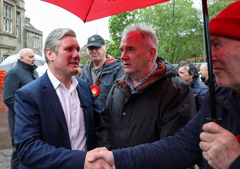 Britain's Labour leader Sir Keir Starmer (L) is under investigation, police said on Friday. Reuters
