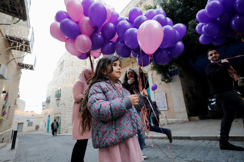 Palestinians in Bethlehem take part in the celebrations. Reuters