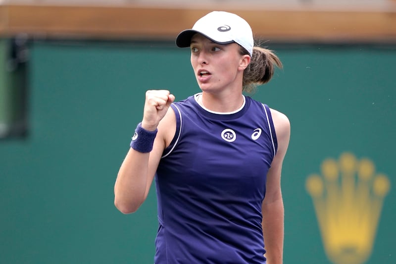 Iga Swiatek in action against Petra Martic during the BNP Paribas Open in Indian Wells, California. AP Photo