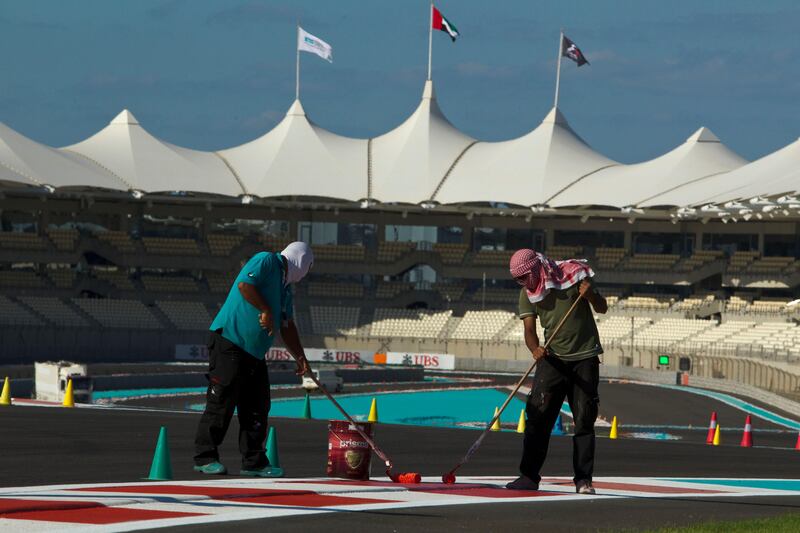 Abu Dhabi, United Arab Emirates, October 31, 2012:    Crews prepare the track for the upcoming Formula 1 Etihad Airways Abu Dhabi Grand Prix at Yas Marina Circuit in Abu Dhabi on October 31, 2012. Christopher Pike / The National