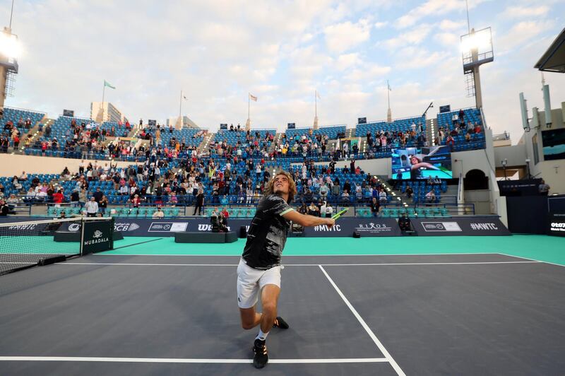 Abu Dhabi, United Arab Emirates - Reporter: Jon Turner: Stefanos Tsitsipas hits a ball into the crowd after his win in the match between Stefanos Tsitsipas v Andrey Rublev at the Mubadala World Tennis Championship. Thursday, December 19th, 2019. Zayed Sports City, Abu Dhabi. Chris Whiteoak / The National