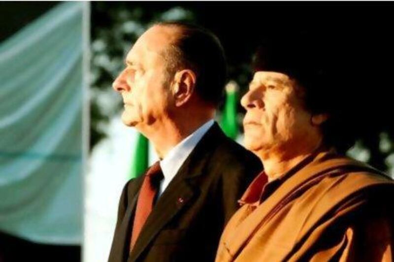 Jacques Chirac, left, who was then the French president, with Muammar Qaddafi on November 24, 2004 in Tripoli, the first visit by a French head of state since 1951.