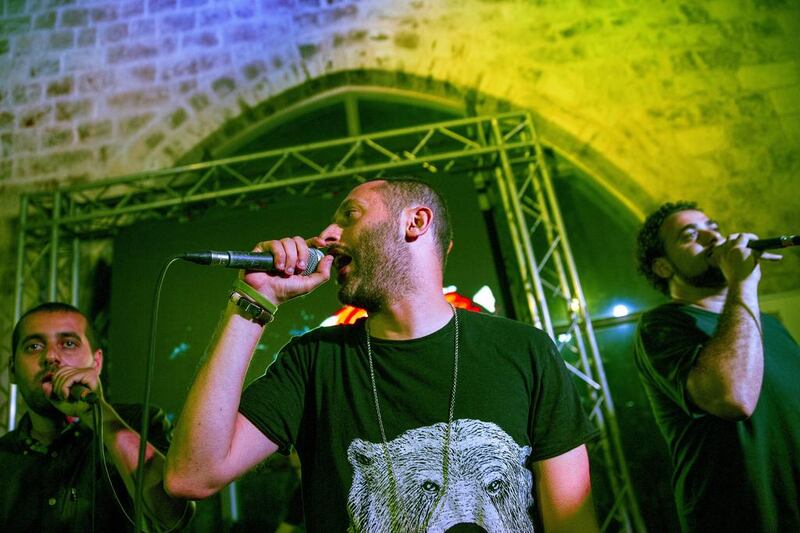 The hip-hop group DAM perform at the 2014 Palestine Festival of literature. Rob Stothard / Getty Images