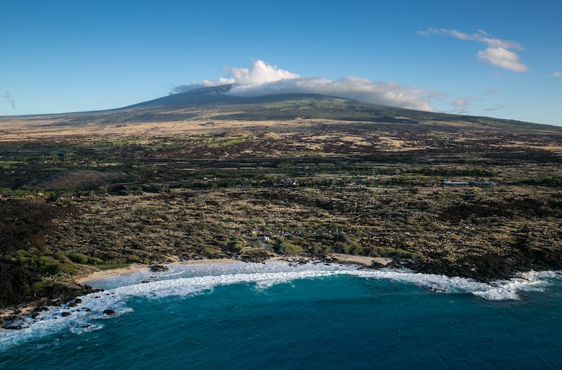 A nearly deserted beach at the edge on an old Mauna Loa lava flow on December 16, 2016, along the Kona Kohala Coast in Hawaii.  Getty Images
