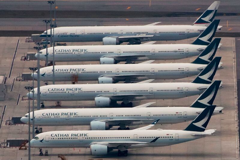 Stricter Covid-19 quarantine requirements have left Cathay Pacific without enough pilots for all its flights. AP