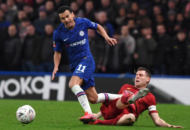 Pedro skips a challenge from Liverpool's James Milner during the FA Cup fifth round tie. EPA