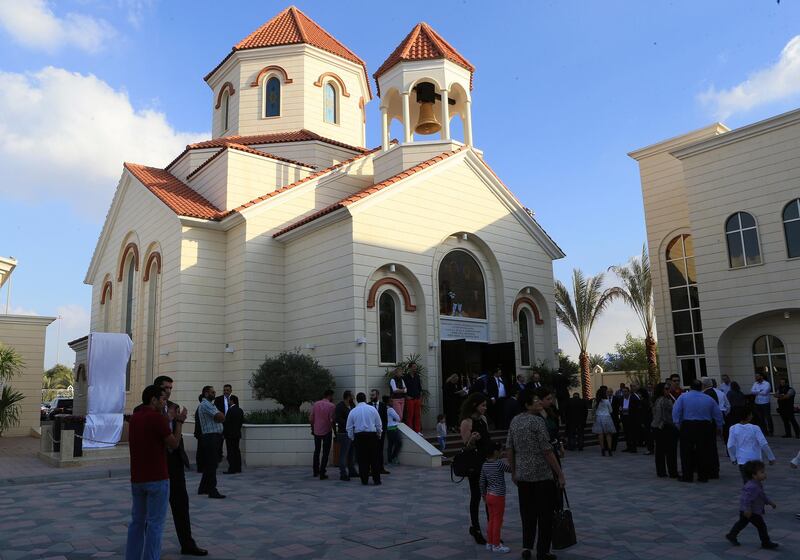 ABU DHABI - UNITED ARAB EMIRATES - 12DEC2014 - Armenian community members gathered to witness Consecration of the Holy Martyrs' Armenian Church at Musaffah area yesterday in Abu Dhabi. Ravindranath K / The National (for News)