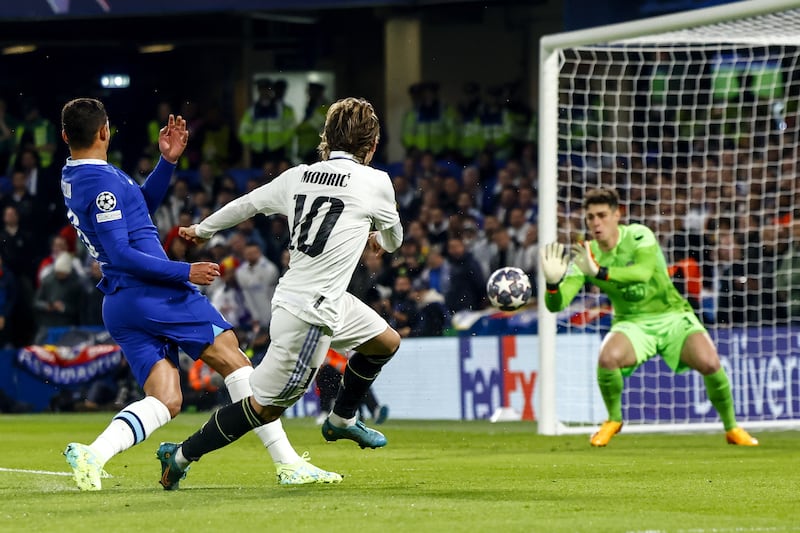 Luka Modric of Real Madrid shoots at Chelsea keeper Kepa Arrizabalaga. EPA