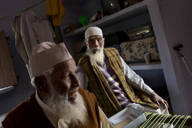 Mr Qadri will keep working on it until he dies. When that happens, his younger brother Mehzul Hasan, 70, pictured in the background, will bury him next to his wife and finish the job.