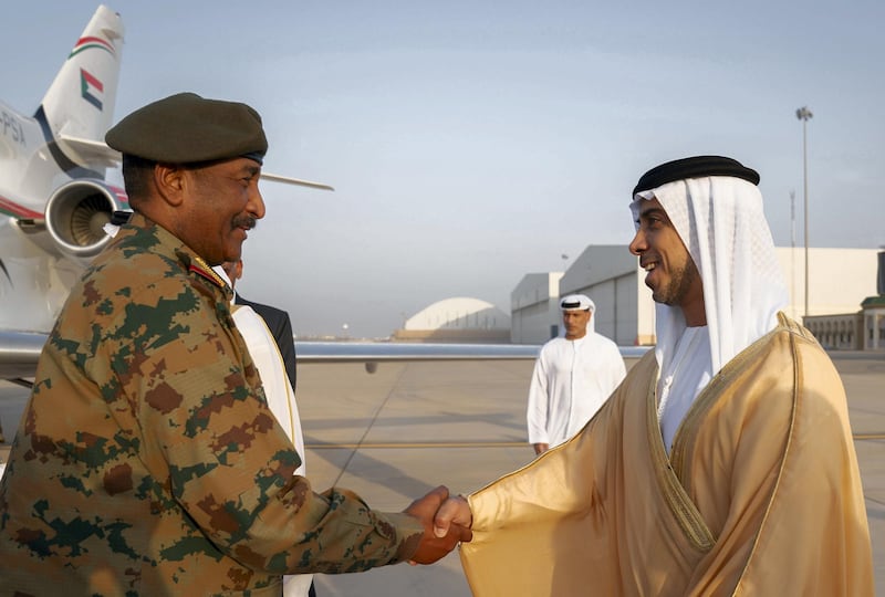 ABU DHABI, UNITED ARAB EMIRATES - May 26, 2019: HH Sheikh Mansour bin Zayed Al Nahyan, UAE Deputy Prime Minister and Minister of Presidential Affairs (R) receives Lieutenant General Abdel Fattah Al Burhan Abdelrahman, Head of transitional military council of Sudan (L), at the Presidential Airport.
( Mohamed Al Hammadi / Ministry of Presidential Affairs )
---