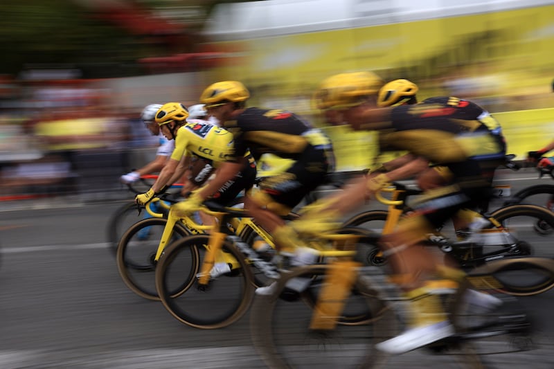 Danish rider Jonas Vingegaard, in yellow, during the final stage. EPA