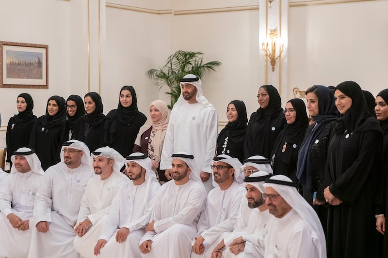 ABU DHABI, UNITED ARAB EMIRATES - October 23, 2018: HH Sheikh Mohamed bin Zayed Al Nahyan, Crown Prince of Abu Dhabi and Deputy Supreme Commander of the UAE Armed Forces (back 7th L), stands for a photograph with Educational Leaders, Universities Directors' and Students' Families, during a Sea Palace barza. Seen with HE Jameela Salem Al Muhairi, UAE Minister of State for Public Education Affairs (back 2nd R), HE Hussain Ibrahim Al Hammadi, UAE Minister of Education (front 4th R) and HE Dr Ali Rashid Al Nuaimi, Chairman of the Department of Education and Knowledge and Abu Dhabi Executive Council Member (front R).

(Rashed Al Mansoori / Crown Prince Court - Abu Dhabi )
---