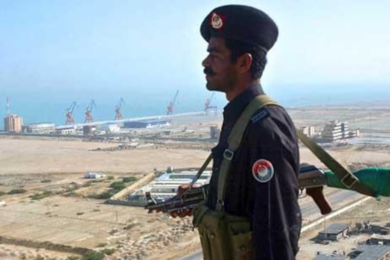 A Pakistani security guard stands near the the Beijing-funded 'megaport' of Gwadar in south-western Pakistan. AFP