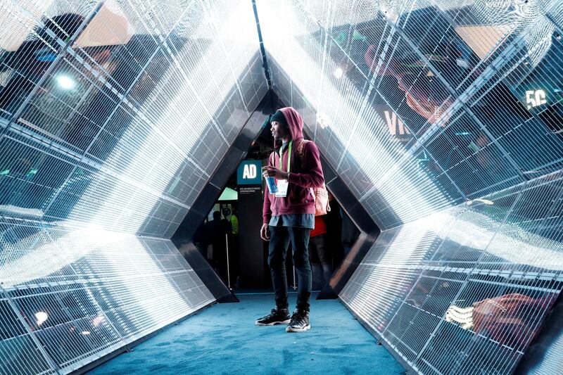 Jordan Jtakin walks through a 5G wireless broadband technology display in the Intel booth during the 2018 CES in Las Vegas, Nevada, US. Steve Marcus / Reuters