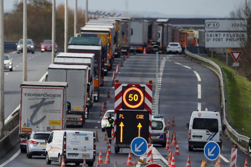 Trucks queue on the Dunkirk-Calais motorway as French Customs Officers increase their controls on transported goods to protest the lack of resources as the Brexit date approaches, in Saint-Folquin, France March 8, 2019. REUTERS/Pascal Rossignol