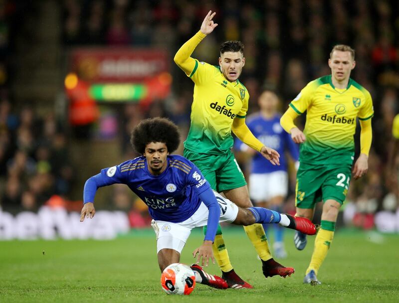 Leicester's Hamza Choudhury is fouled by Emiliano Buendia of Norwich. Reuters