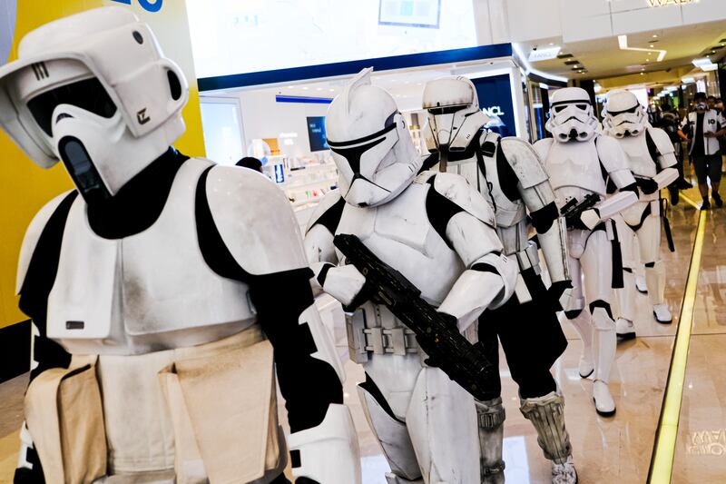 Storm Troopers march inside a mall during Star Wars Day on May 4, 2023 in Hong Kong. Getty Images