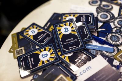 Free Bitcoin pocket information guides sit on a table at the BTC.com marketing stand at the Lisbon Web Summit in Lisbon, Portugal, on Tuesday, Nov. 7, 2017. Portugal is hoping to bolster its reputation as a startup hub in Europe at a time when political instability in Spain’s Catalonia and the U.K.’s decision to exit the European Union are triggering growing interest in the southern European country. Photographer: Daniel Rodrigues/Bloomberg