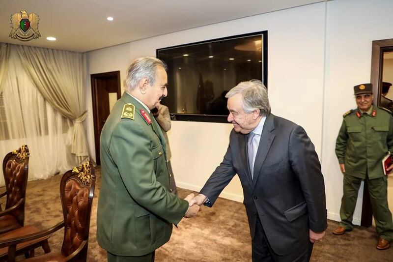 Secretary General of the United Nations Antonio Guterres meets shakes hands with Libyan military commander Khalifa Haftar in Benghazi, Libya April 5, 2019. Media office of the Libyan Army/Handout via REUTERS ATTENTION EDITORS - THIS IMAGE WAS PROVIDED BY A THIRD PARTY NO RESALES. NO ARCHIVE.