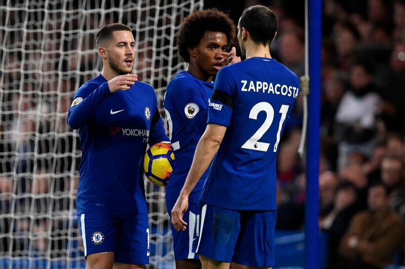 epa06594592 Chelsea's Eden Hazard (L), Willian (C) and Davide Zappacosta (R) celebrate after Crystal Palace's Martin Kelly scored an own goal during the English Premier League soccer match Chelsea vs Crystal Palace at Stamford Bridge, London, Britain, 10 March 2018.  EPA/WILL OLIVER EDITORIAL USE ONLY. No use with unauthorized audio, video, data, fixture lists, club/league logos or 'live' services. Online in-match use limited to 75 images, no video emulation. No use in betting, games or single club/league/player publications