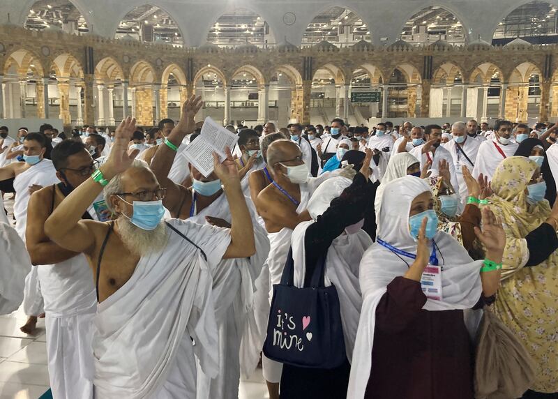 Muslim pilgrims wear masks in the holy city of Mecca, Saudi Arabia. AP